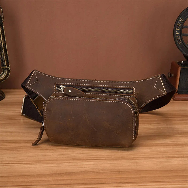 Brown top layer cow leather men's sports waist bag with a zip closure.
