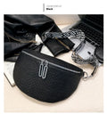 Solid colour PU crossbody bag with saddle lock zipper and sewing thread detail, beige colour, front view