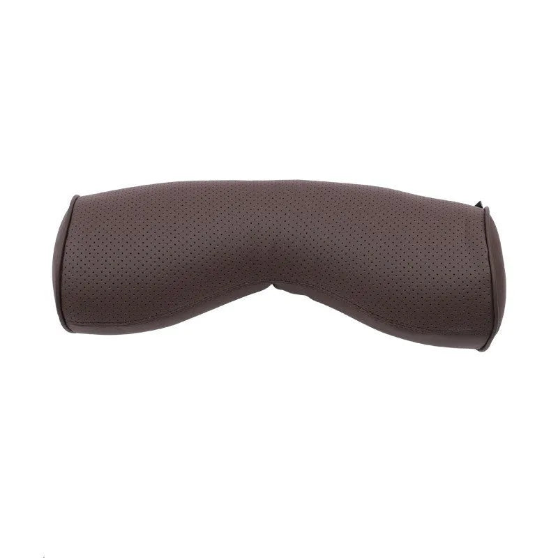 Minimalist brown synthetic fibre headrest cushion and neck pillow for a Volvo car seat.