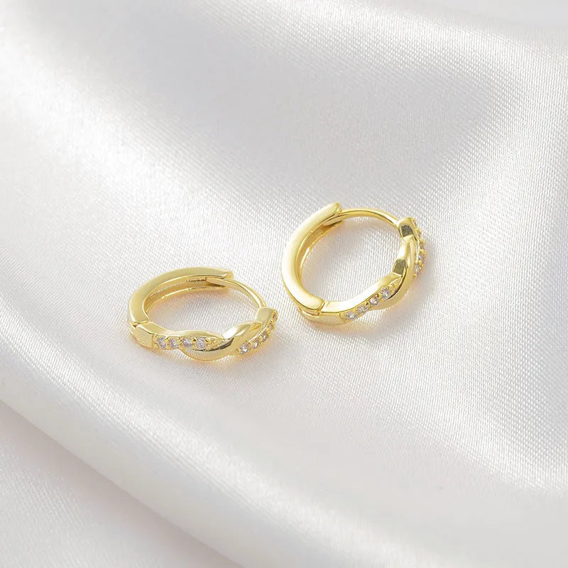 Geometric hemp rope earclip earrings with interwoven design in gold or silver colour options