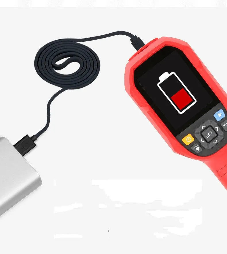 UTi series handheld infrared thermal imaging camera on a workbench with SD card and USB cable.