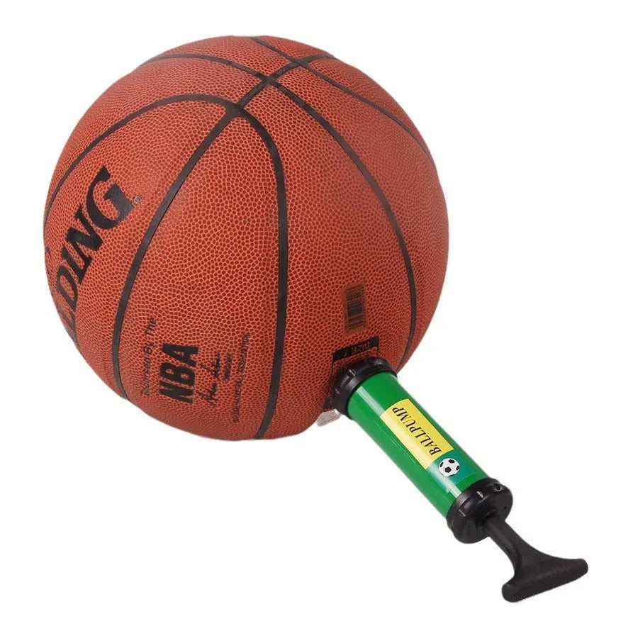 Plastic manual hand pump with nozzle adaptors for inflating sports balls and balloons.