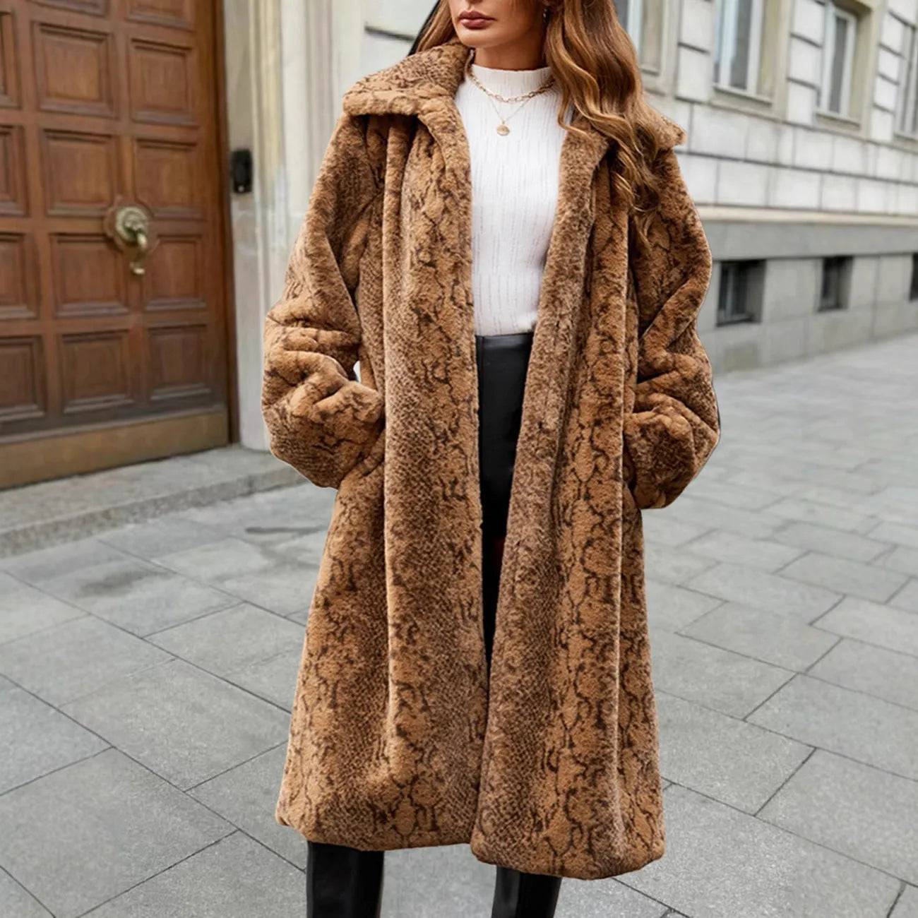 Women's long faux fur coat in leopard print pattern with plush texture and regular sleeves