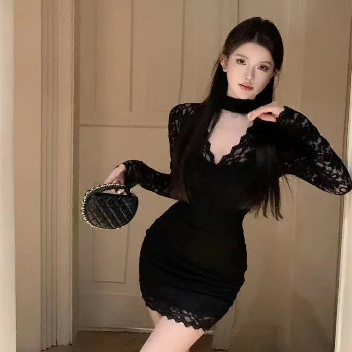 Black halter neck lace dress with floral pattern and built-in inner skirt