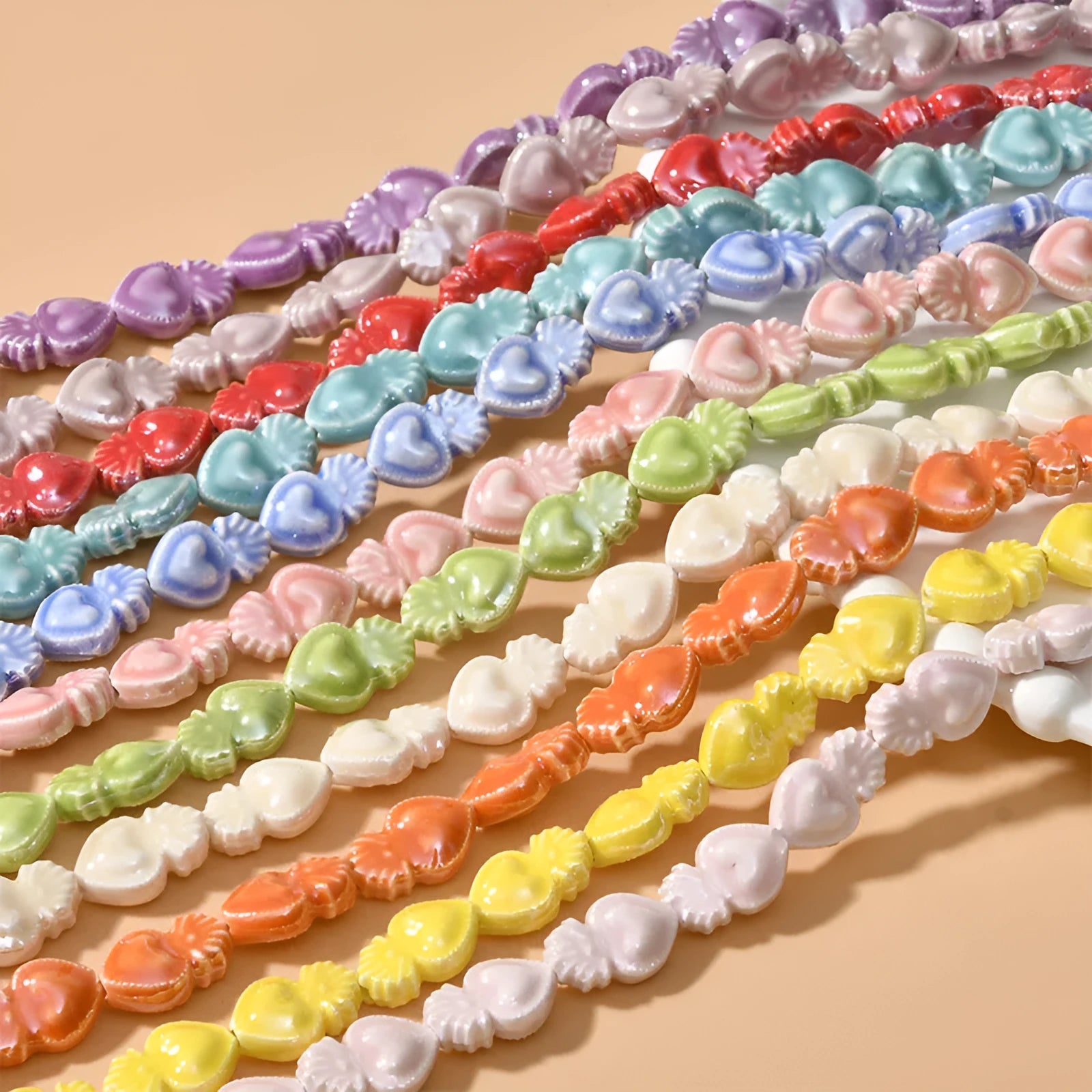 Ceramic love heart beads in assorted colours, 10x15mm size with straight 1.7mm hole