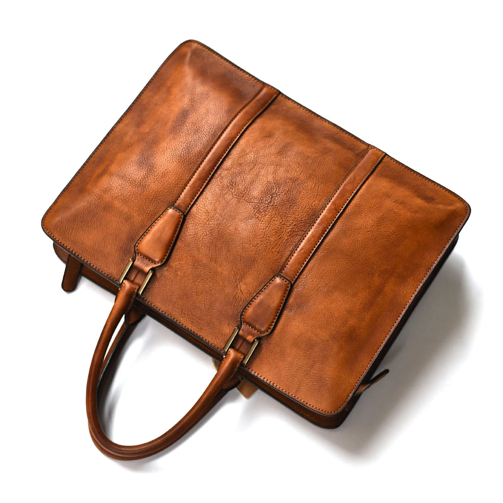 Men's 14-inch vegetable tanned leather handbag in horizontal square design