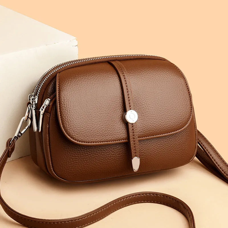 City Simple women's soft PU oval crossbody shoulder bag with sewing thread detail in Black 2545