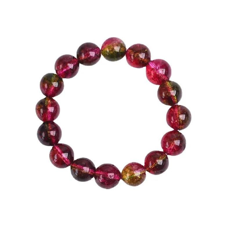 Handmade watermelon crystal bracelet for women showing pastoral design on a wrist.
