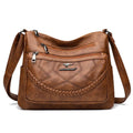 Soft leather large capacity shoulder bag in horizontal square shape with multiple compartments