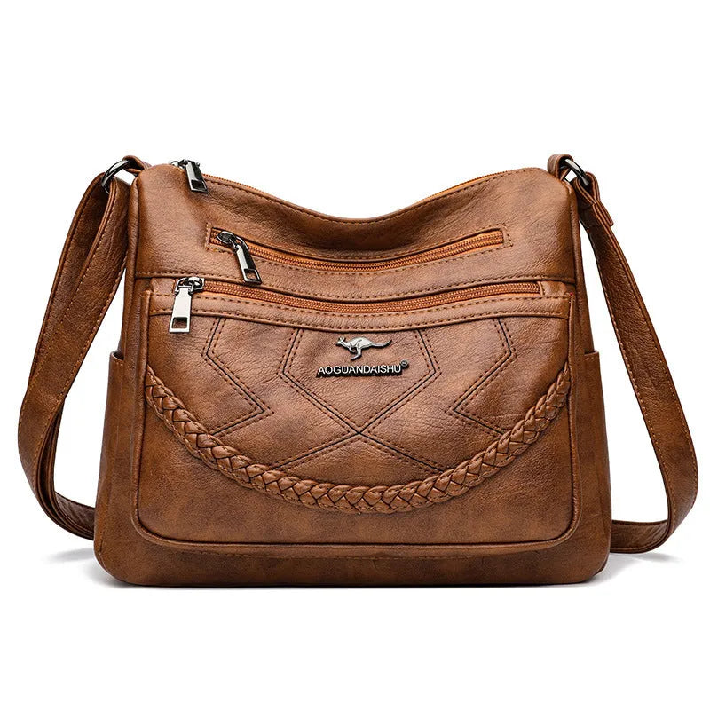 Soft leather large capacity shoulder bag in horizontal square shape with multiple compartments