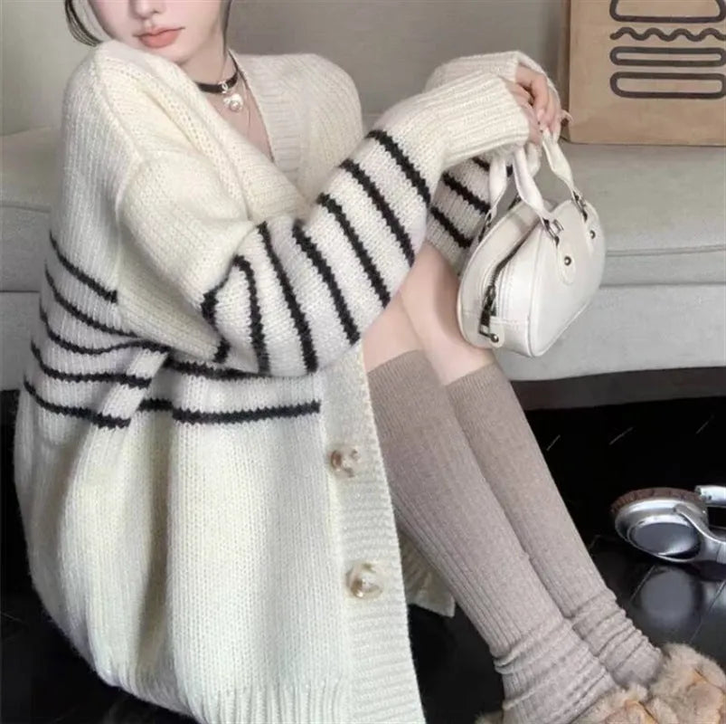 Women's grey collar button cardigan with 3D pattern, shown open and buttoned.