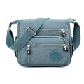 Nylon messenger bag with square vertical shape in one of five colour options
