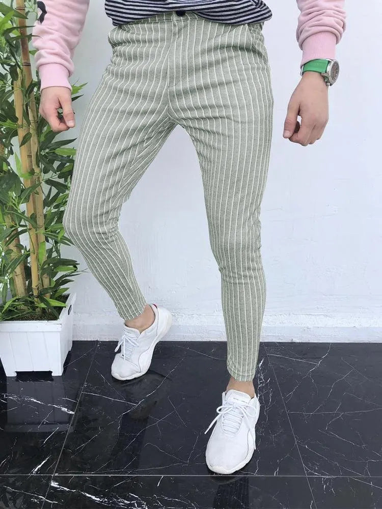 Men's slim-fit plaid casual trousers in a straight-leg style on a neutral background.