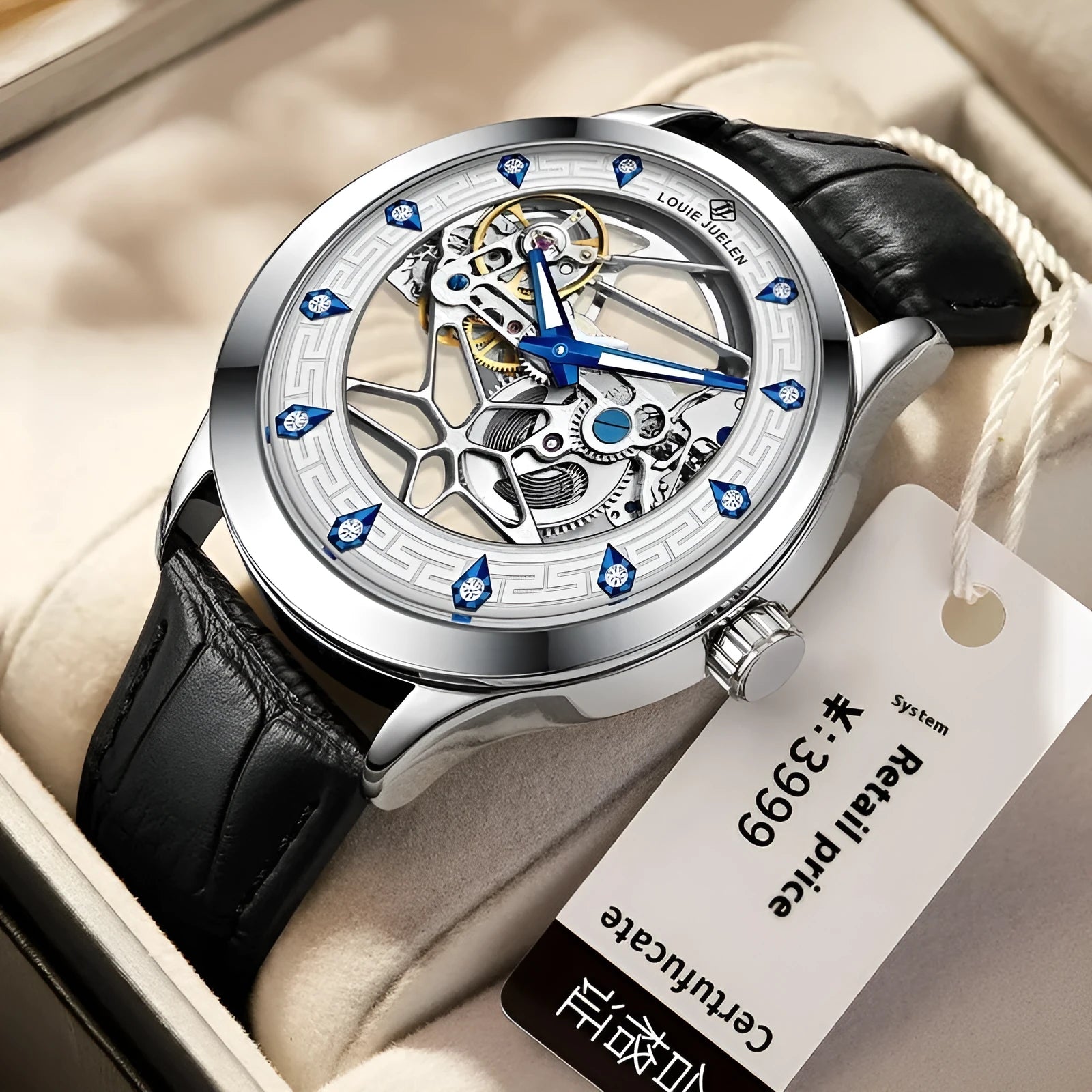 Men's silver mechanical watch with white dial, blue hands, and brown leather strap