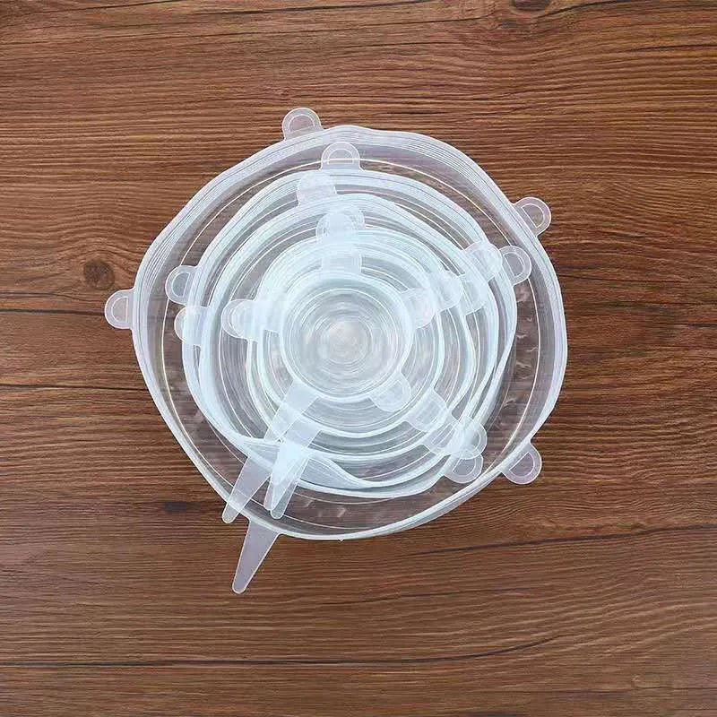 6 silicone food stretch lids in assorted sizes on a kitchen counter for fresh-keeping