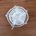 6 silicone food stretch lids in assorted sizes on a kitchen counter for fresh-keeping