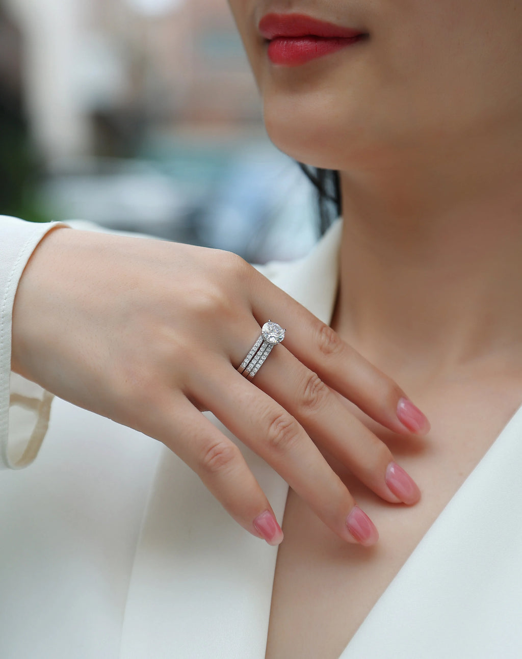 Dreamy 2-carat moissanite wedding ring set on white background, S925 silver platinum-plated band