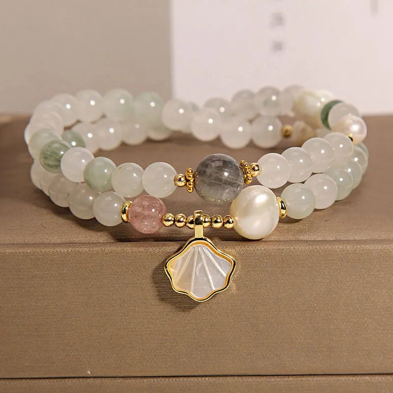 Women's crystal bracelet with Tianshan jade ginkgo leaf pendant and gold-plated setting