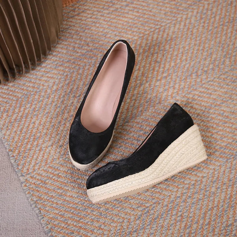 Women's wedge heel pumps with rope bottom detail in apricot colour showing shallow mouth design