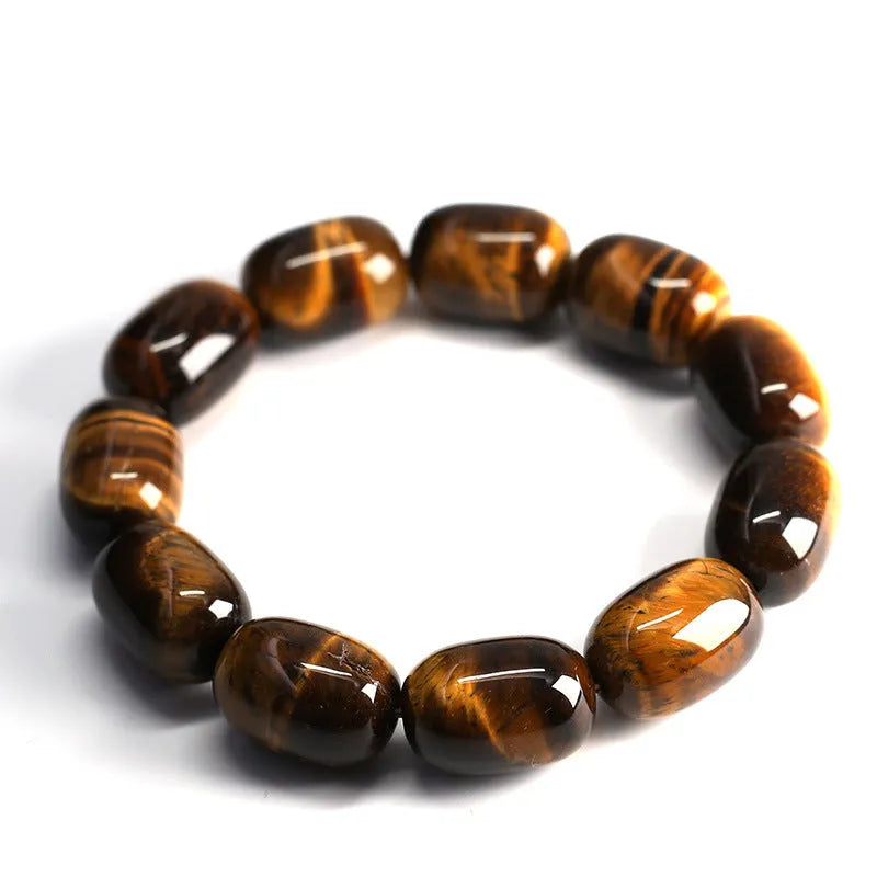 Natural yellow tigereye bracelet with cat eye sheen, 11x16mm beads, unisex constellation style on white background