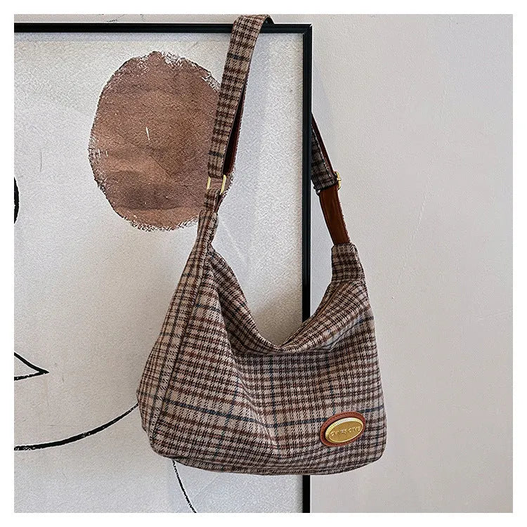 Large capacity soft woolen shoulder bag for women in khaki with pendant, horizontal square shape with sewing line detail.