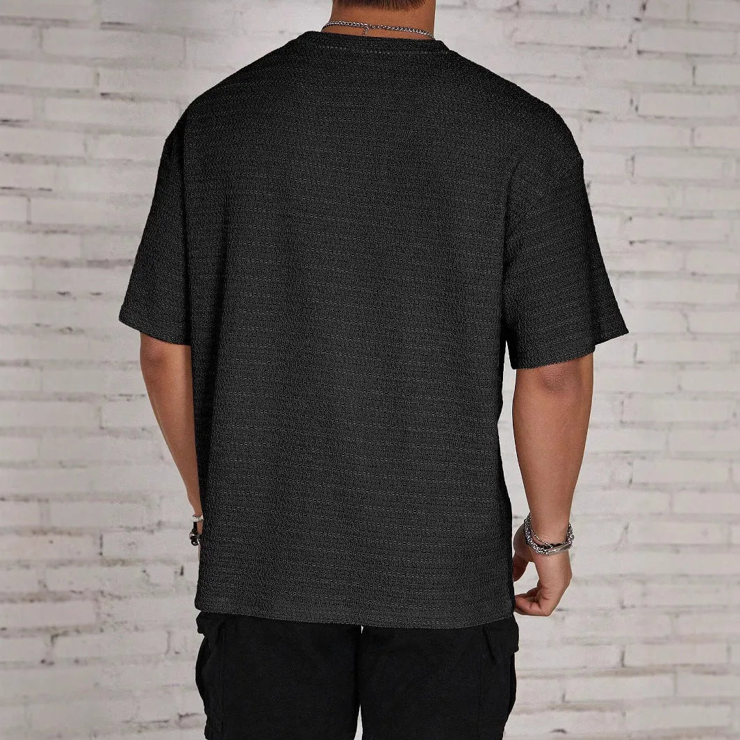 Men's loose fit round neck T-shirt in solid colour with short sleeves