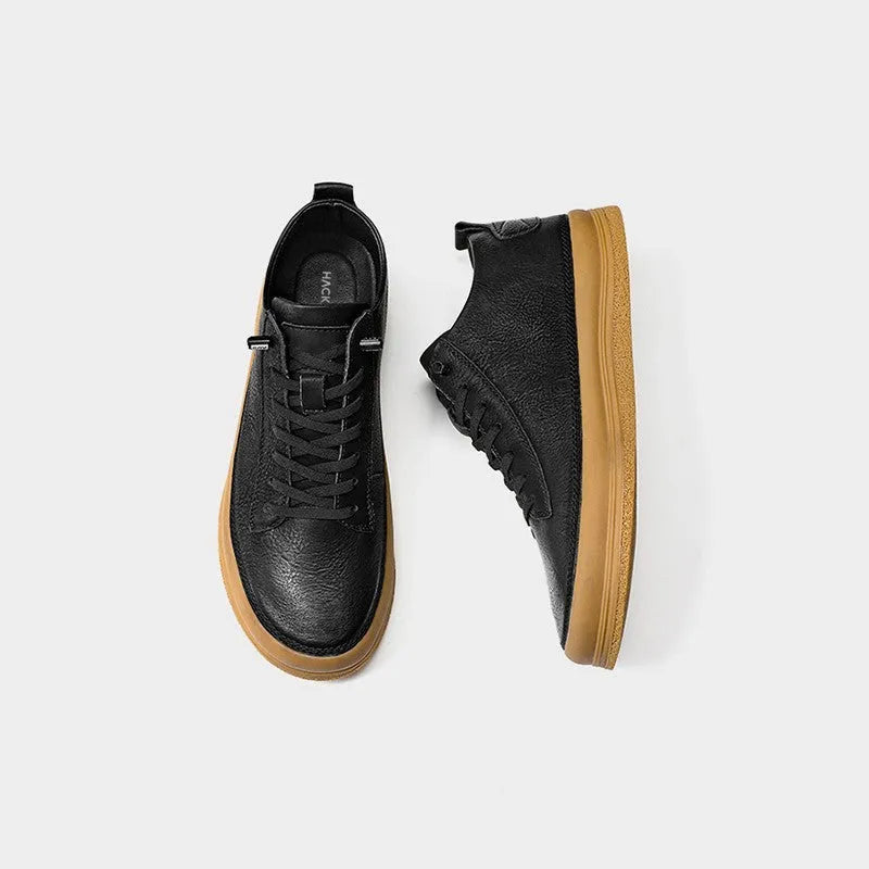 Men's black leather lace-up casual shoes with a round toe and rubber sole on a white background.