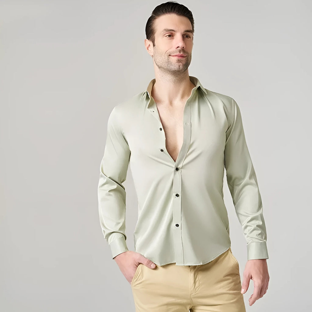 Men's stretch polyester long sleeve work shirt shown in a light colour on a hanger