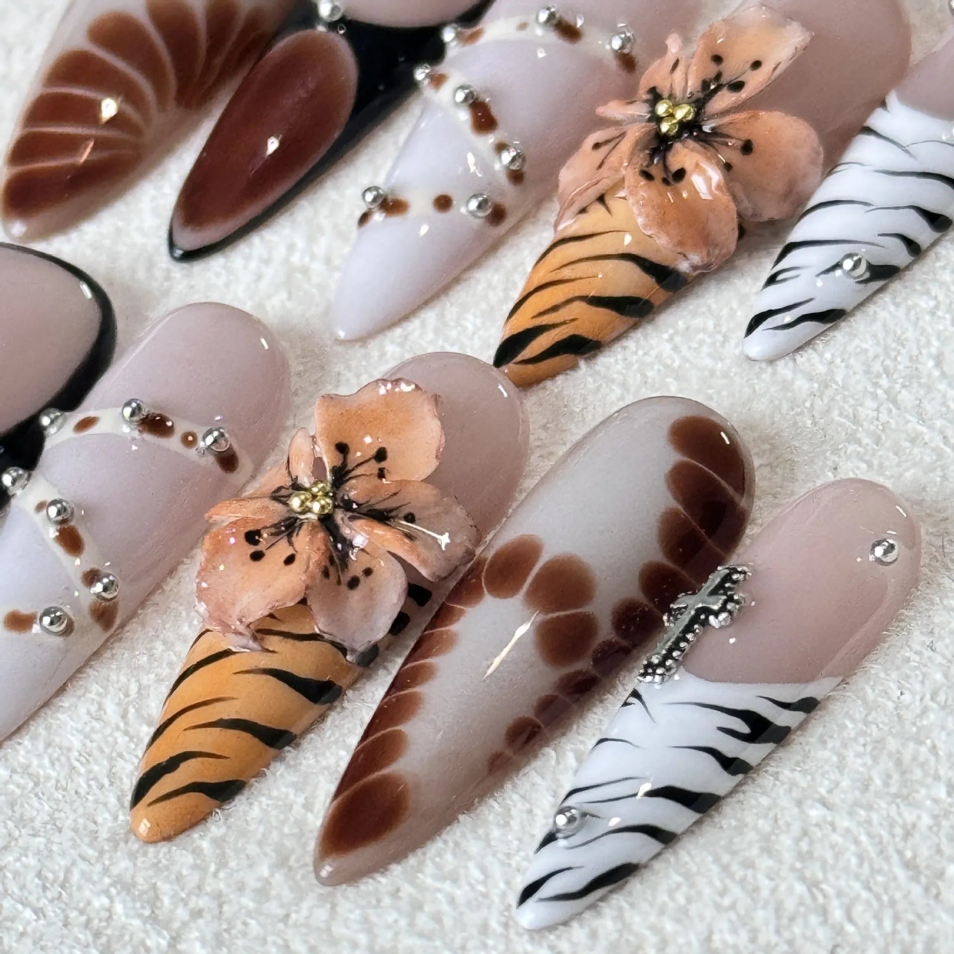 Handmade French style leopard print nail stickers with cross and flower patterns in long tip design available in sizes XS to L