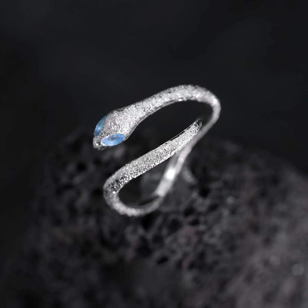 Adjustable silver snake ring with white gold electroplated finish showing detailed serpent modelling