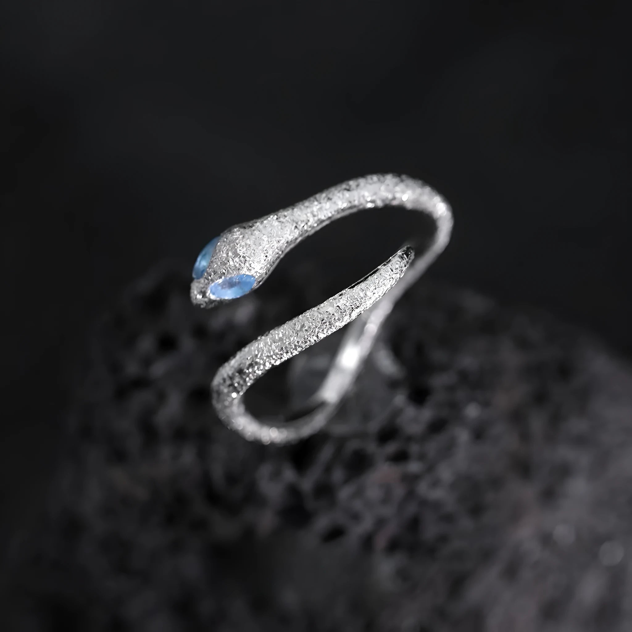 Adjustable silver snake ring with white gold electroplated finish showing detailed serpent modelling