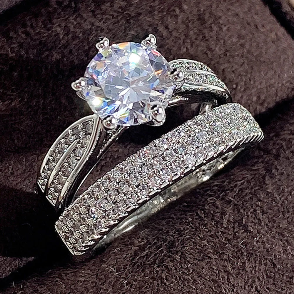Geometric wedding bracelet ring in white gold colour alloy showing round design elements