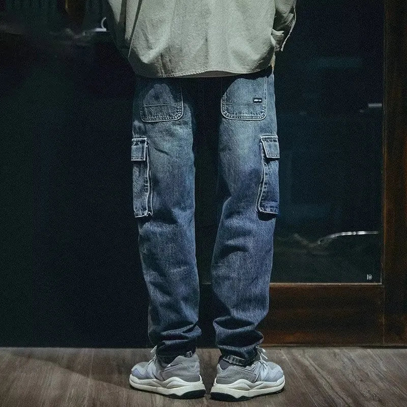 Men's blue loose straight leg jeans with retro styling and zip fly opening