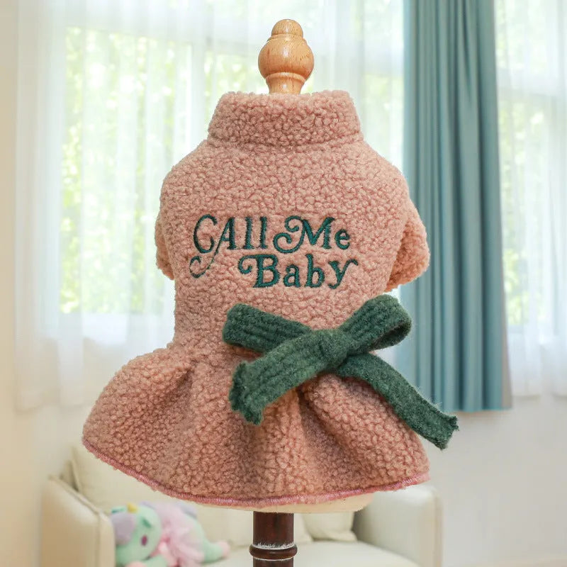 Pet clothing warm Berber fleece skirt in dark blue with letter print on a standing dog.
