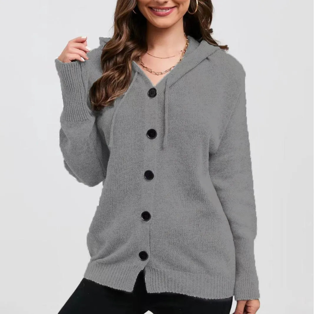 Women's loose fit hooded cotton cardigan sweater in a solid colour with long sleeves.