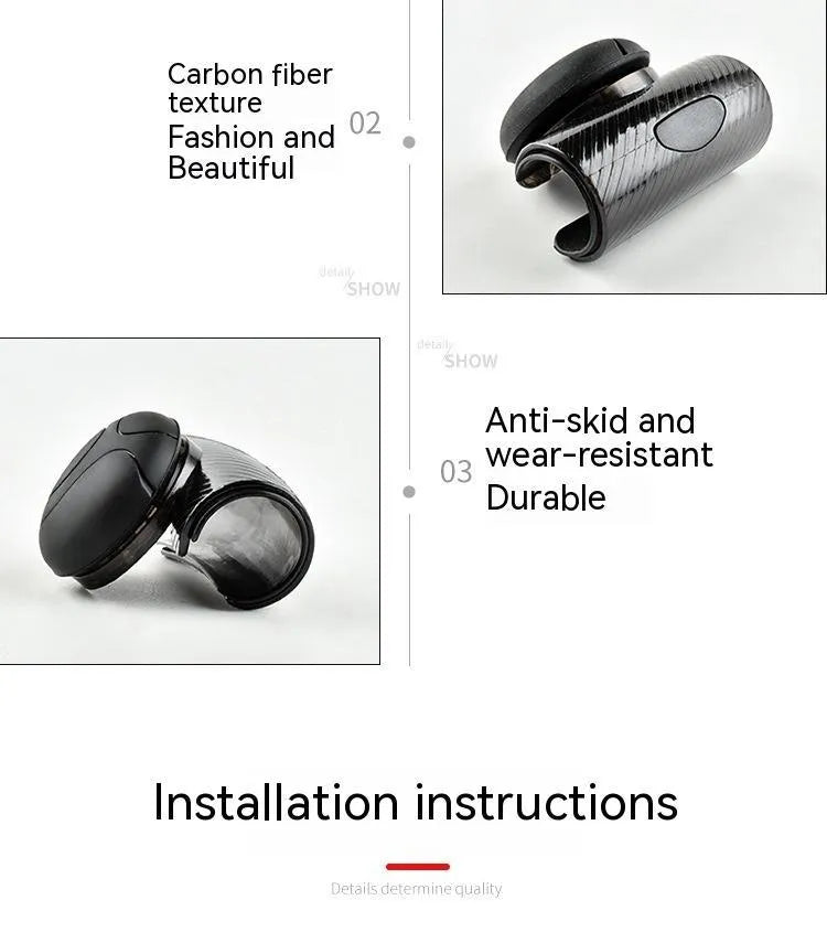 Black silicone steering wheel assist ball with metal bearing on a car steering wheel.