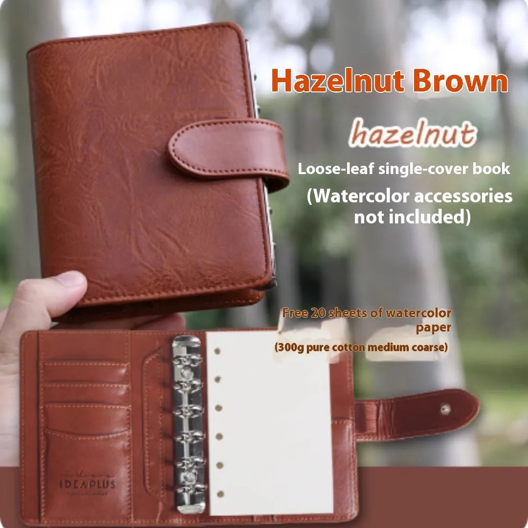 A7 loose-leaf watercolour notebook in one of five colours: Avocado Green, Hazelnut Brown, Mango Pudding, Mocha Coffee, or Rainforest Green.