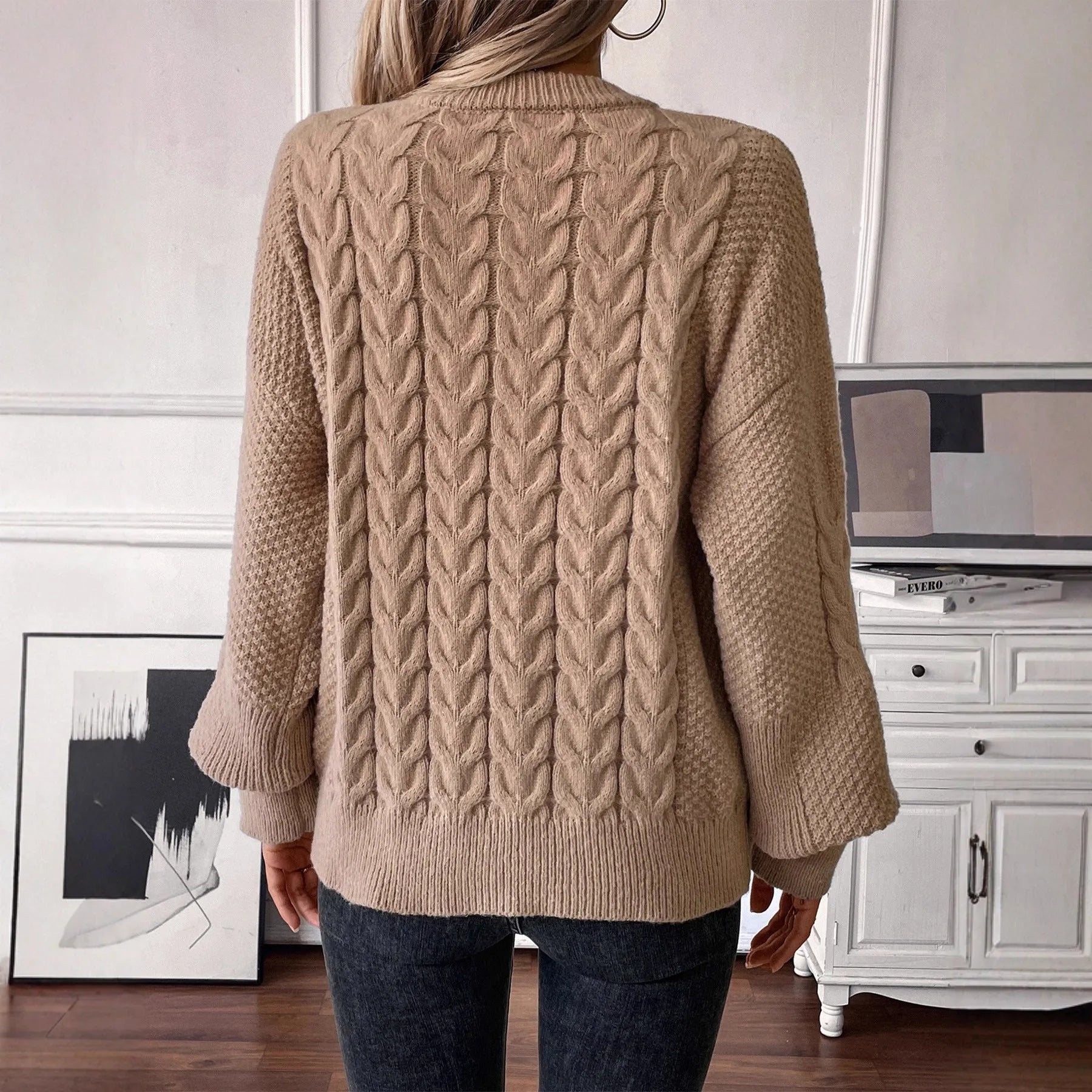 Women's beige loose pullover sweater with twist detail and round neck