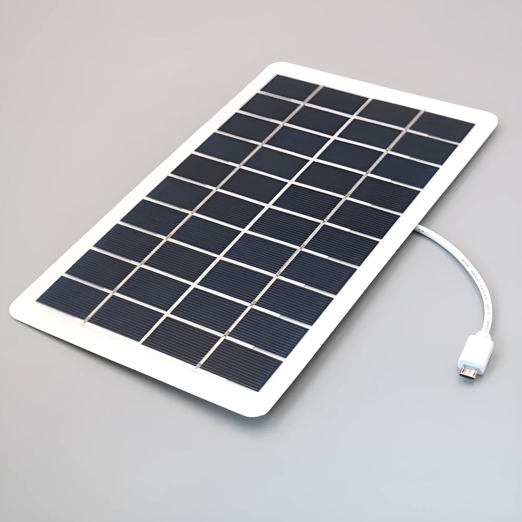Portable black solar panel mobile phone charger with USB output and PET surface