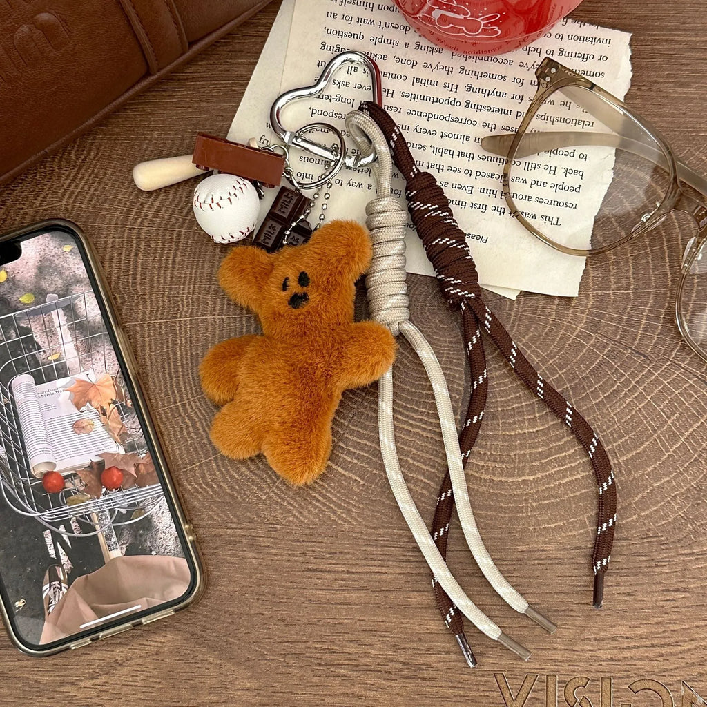 Plush brown bear doll pendant on a bag charm with soft fabric and small size