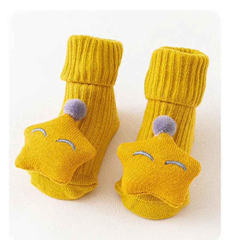 Cotton baby floor socks in multiple patterns including blue bow and lion designs