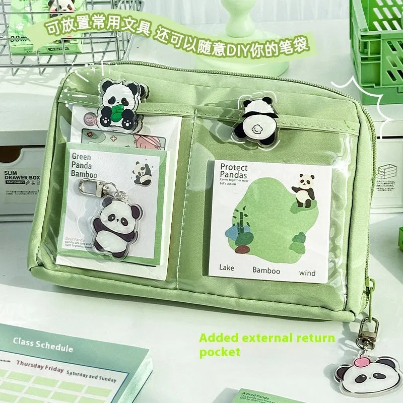 Green 12-layer canvas pencil case with panda motif and open layers showing pen storage