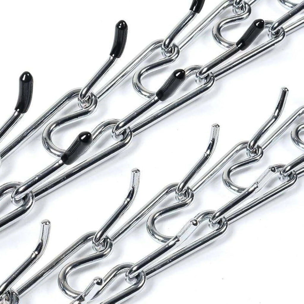 Stainless steel dog prong training collar with black comfort rubber tips on adjustable chain links.