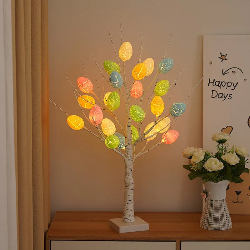 60cm birch-style Easter tree with warm white LED lights and cracked egg ornaments on a tabletop
