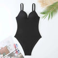 Women's black one-piece swimsuit with sunken stripe pattern and sleeveless design