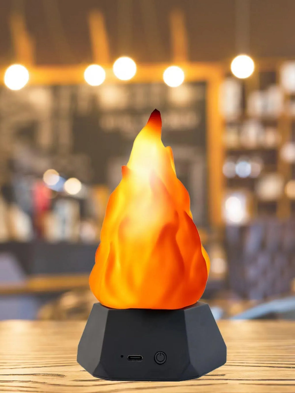 Flame shaped outdoor decorative light with vinyl shell and gold charging base