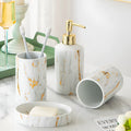 White ceramic marble effect bathroom wash kit with two cups, latex bottle, and soap box in colour box