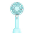 Blue handheld mini desktop USB fan with shaking head showing three-speed controls