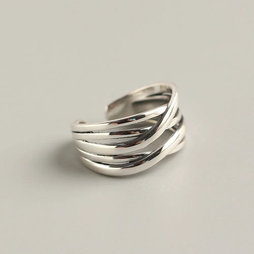 S925 sterling silver vintage weave ring for women, retro silver finish with textured weave pattern on plain background