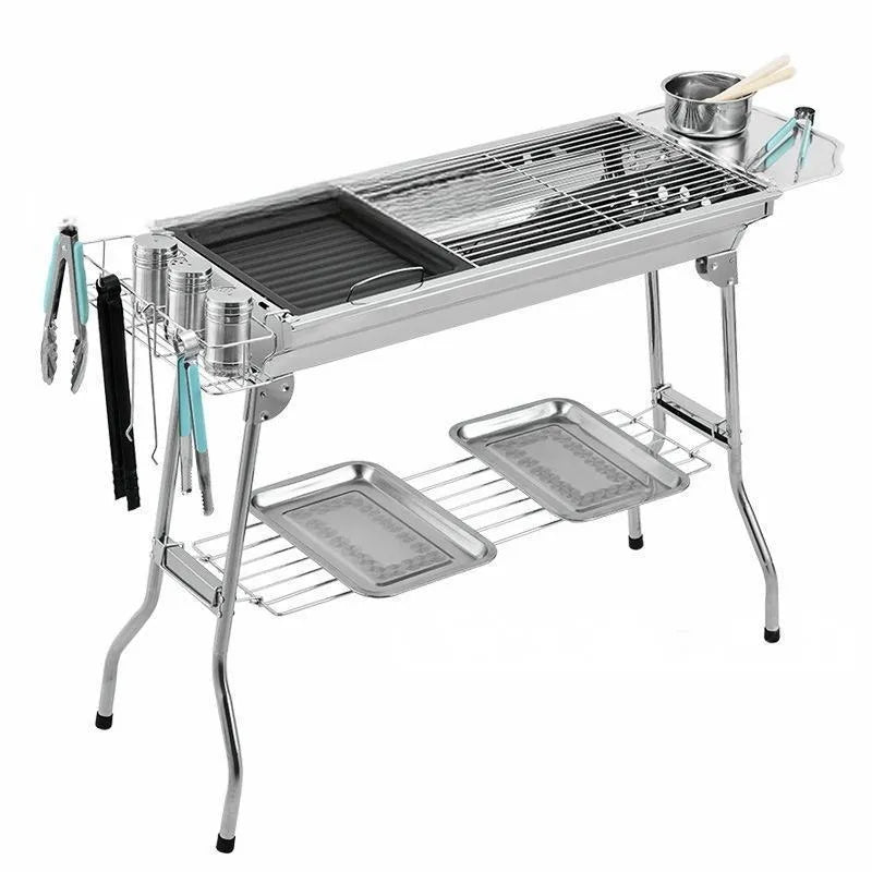 Stainless steel portable barbecue oven with flip design and included grills for outdoor cooking